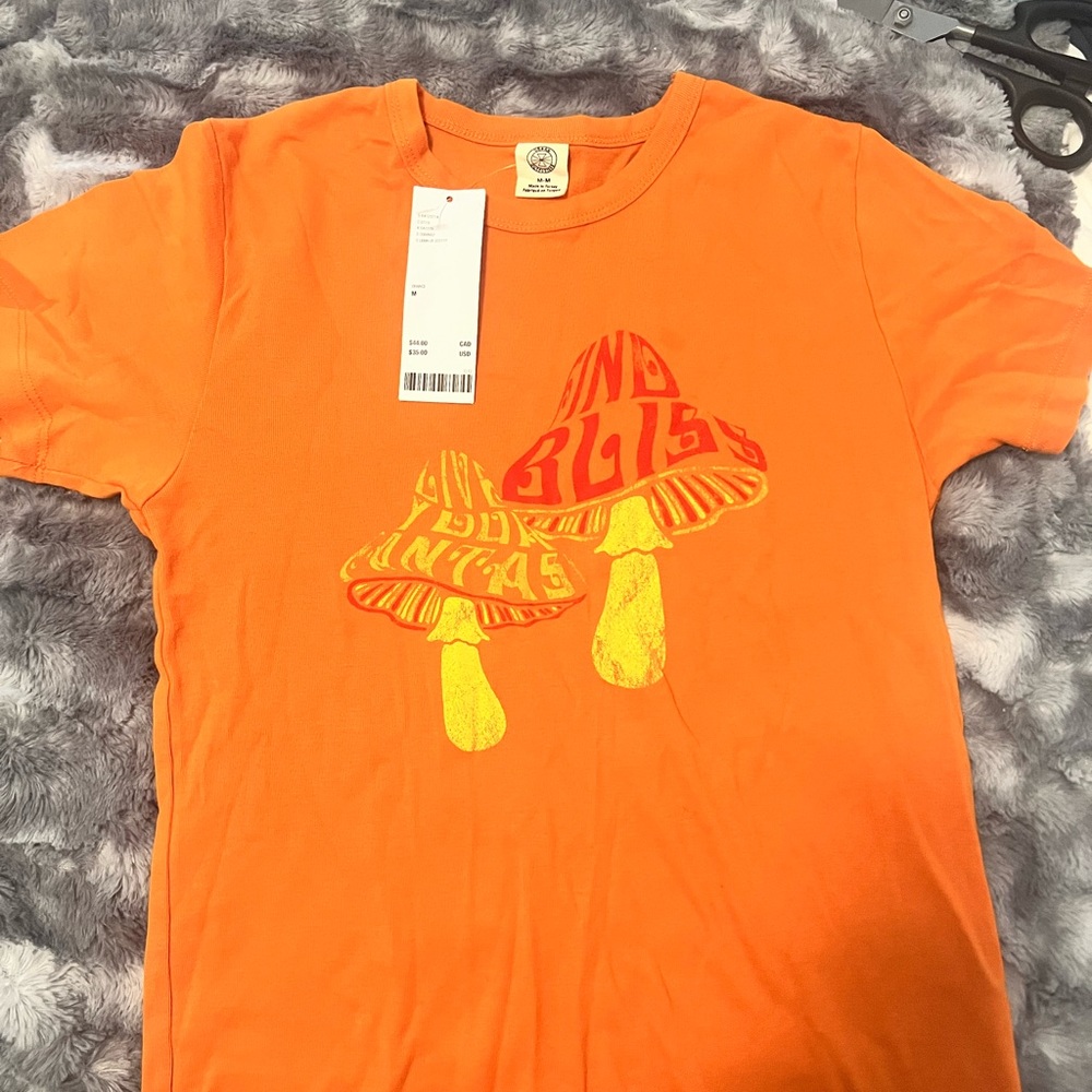 Orange Urban Outfitters graphic baby tee. Size medium.